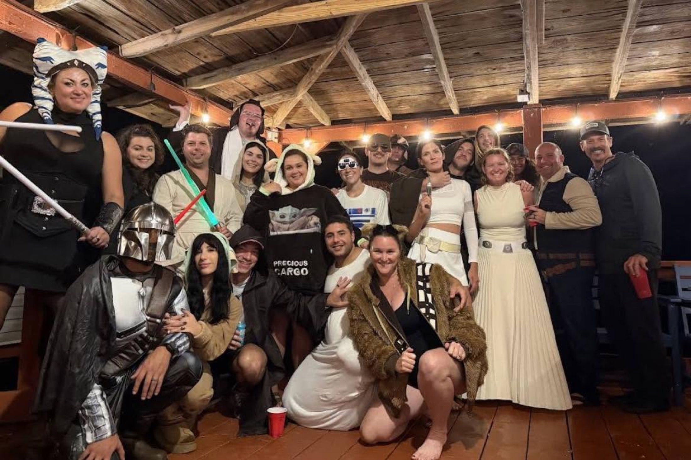 A group dressed up together for a themed night at the lake