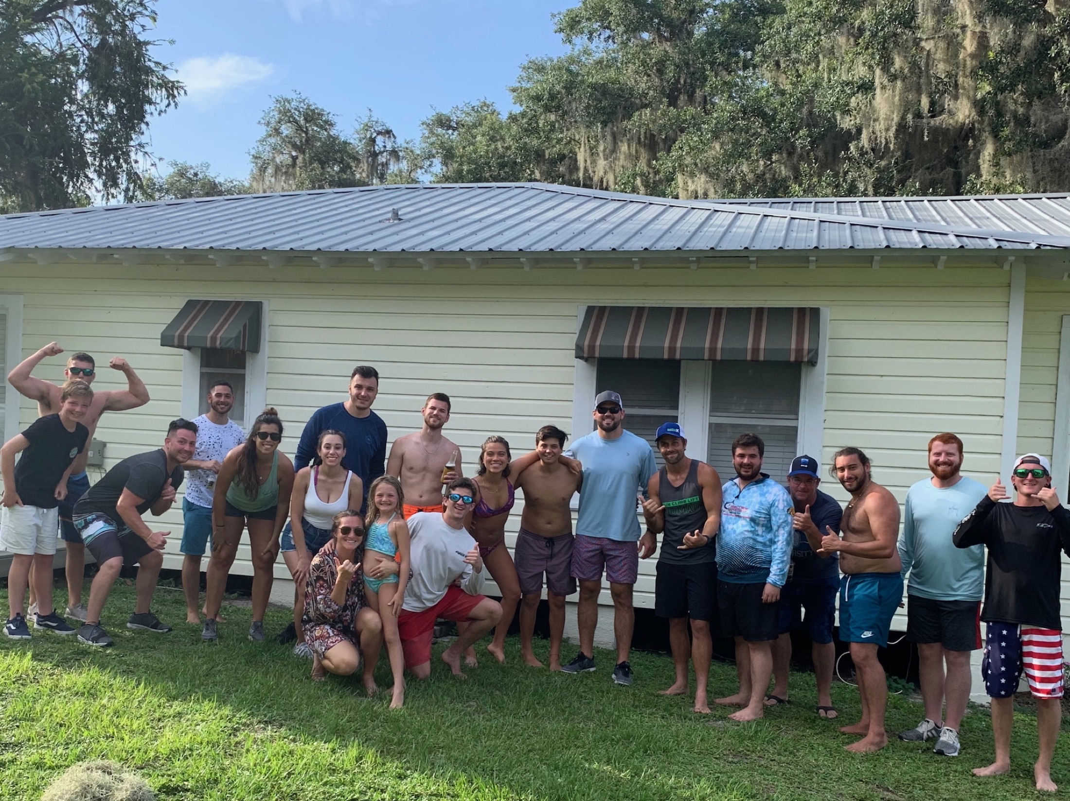 Friends gathered together on the cottage lawn