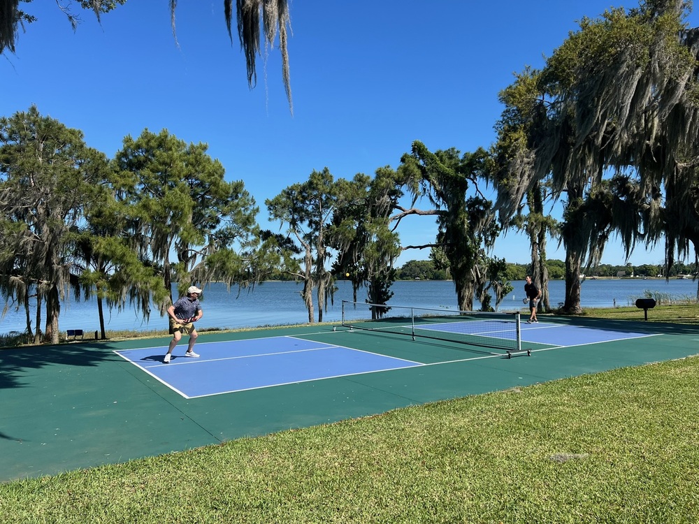 Tennis court by the lake